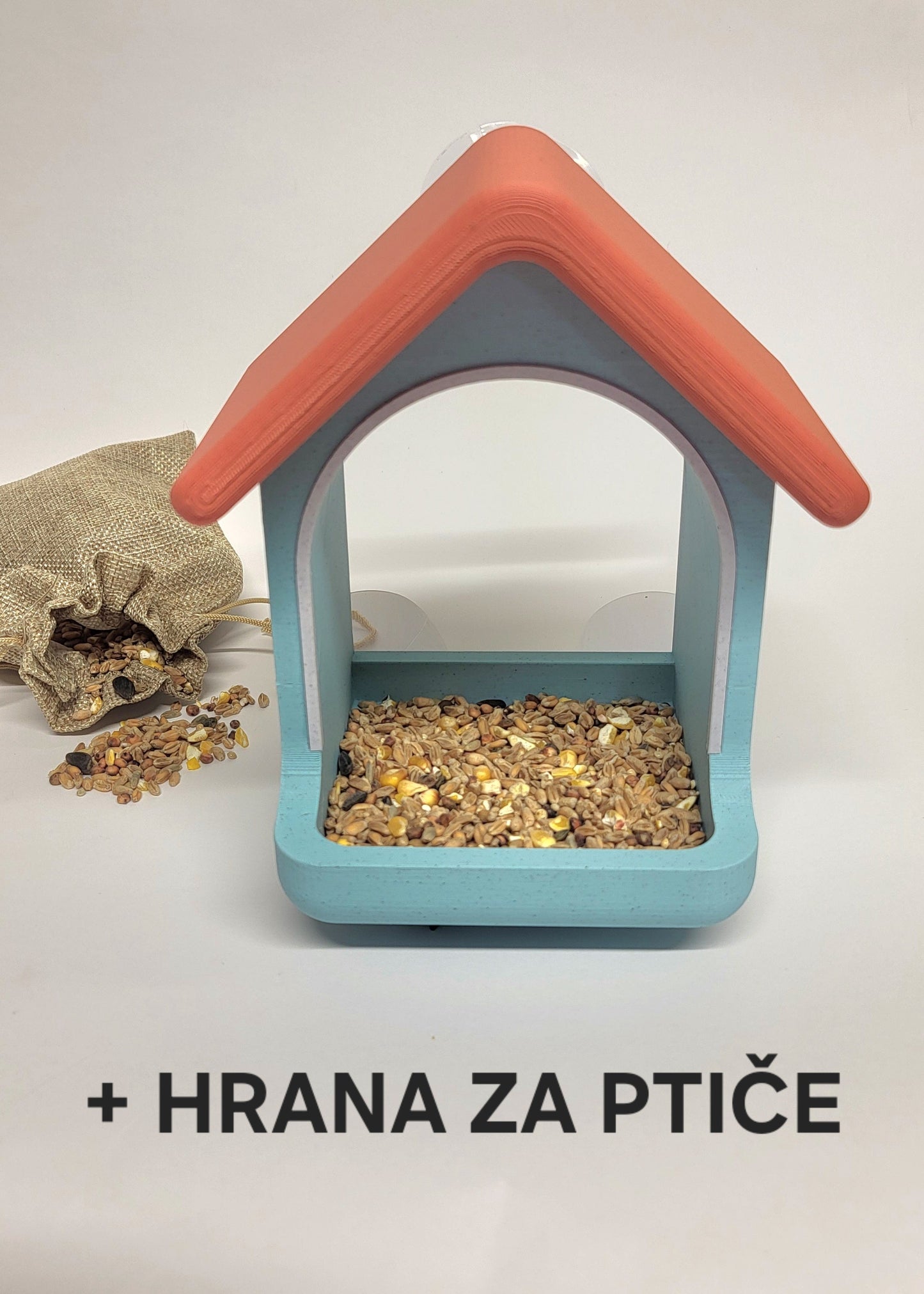 Ptičja hiška – hranilnica za okno s priseski