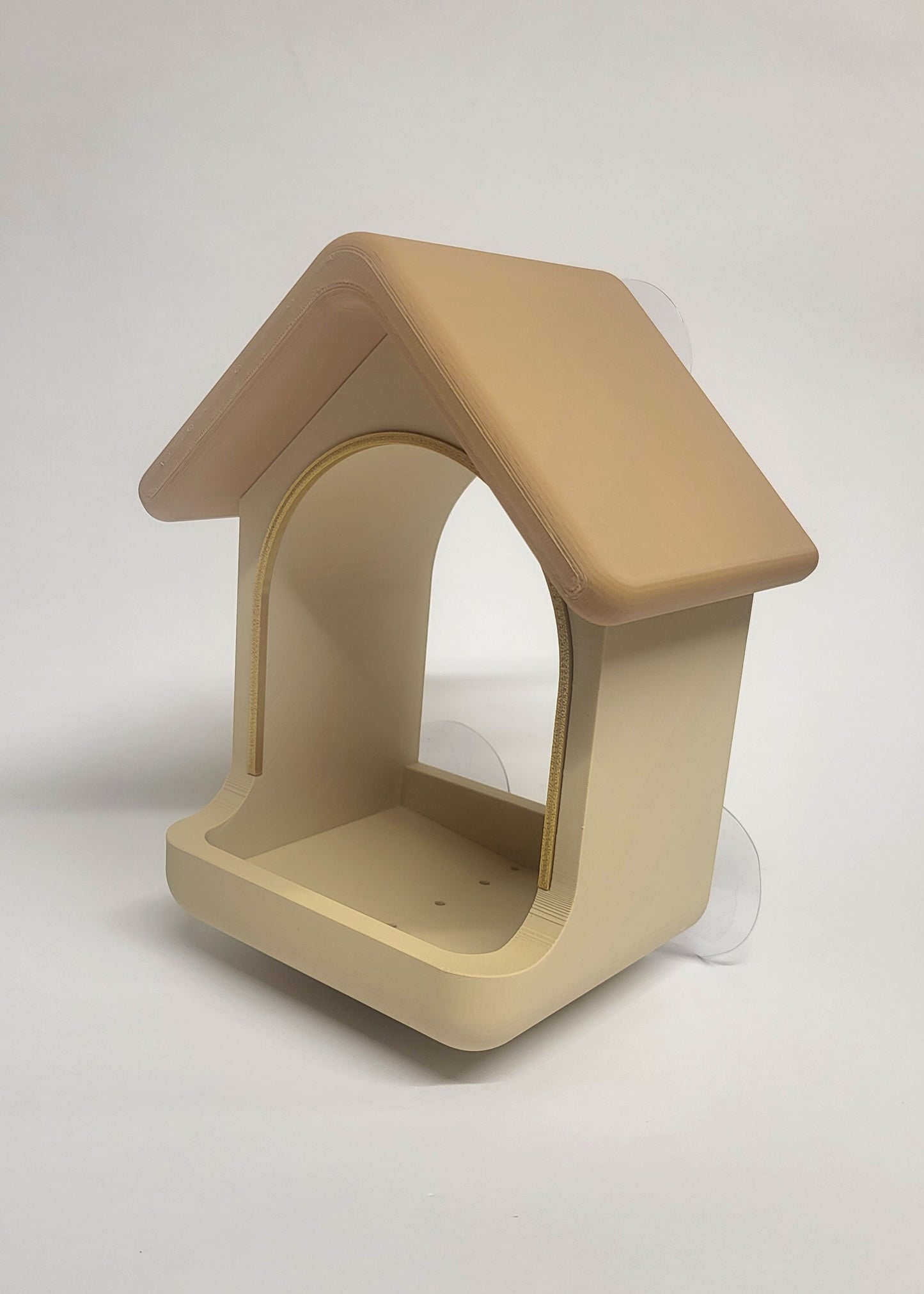 Ptičja hiška – hranilnica za okno s priseski